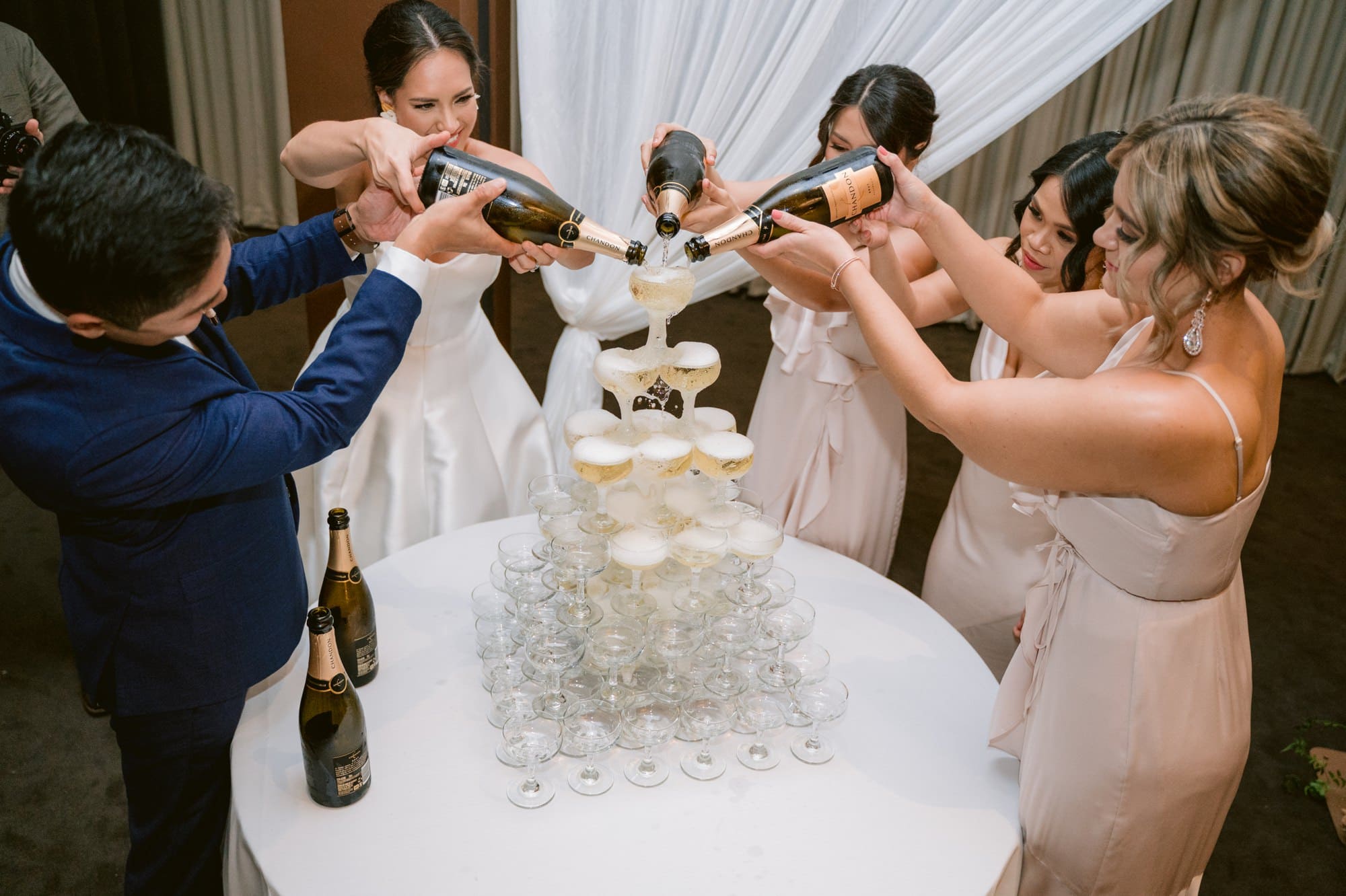 Victoria Park wedding photographer champagne tower bridal party reception details